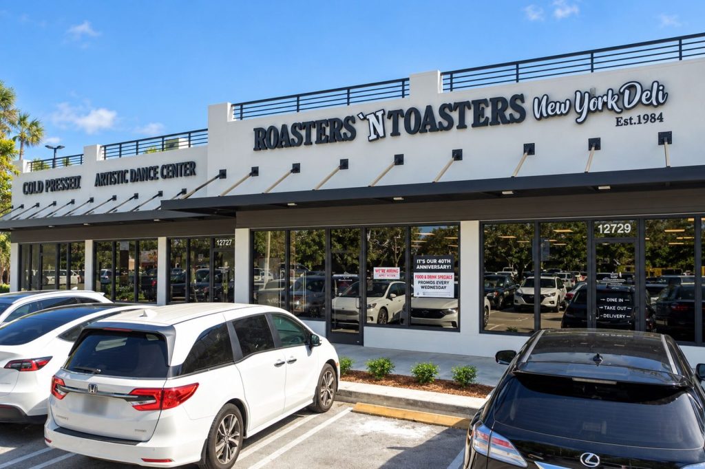 Roasters 'n Toasters storefront with channel letters in daylight