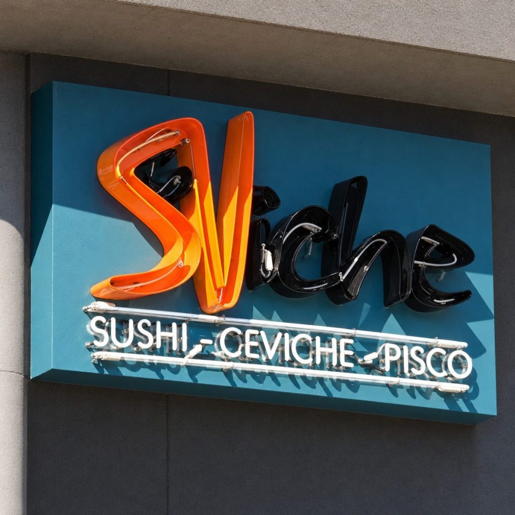 Suviche neon sign in daylight